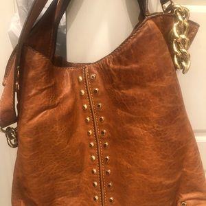 Michael Kohrs large brown leather bag with gold chain